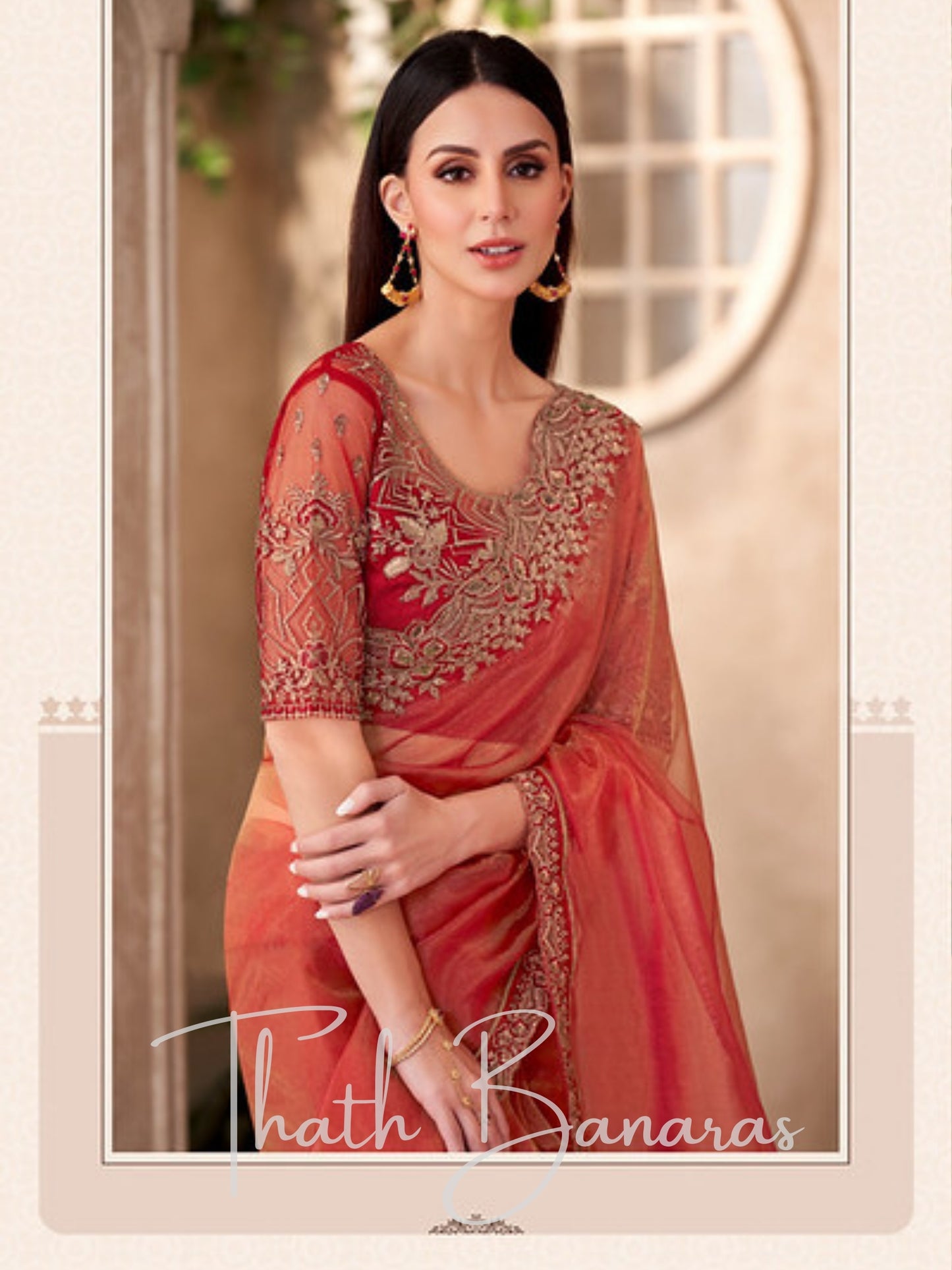 Orange Tissue Traditional Saree with Embroidered Work.