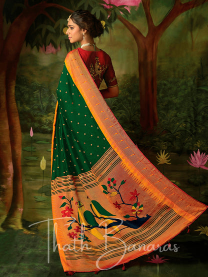 Deep green and red Paithani saree with designer blouse