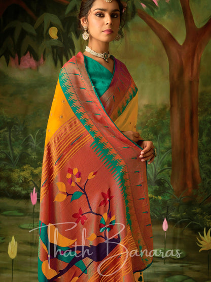 Mustard yellow and red Paithani saree with designer blous