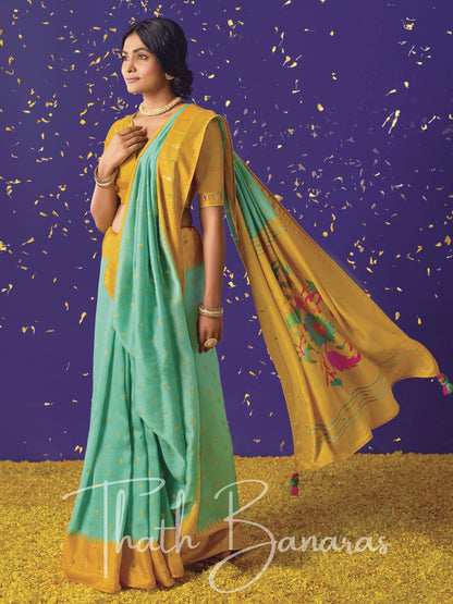 Blue and yellow Paithani saree with designer blouse