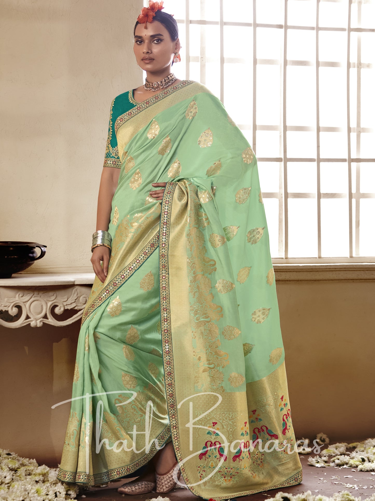 Sea green Pure Dola Silk Saree with Fancy Lace Border