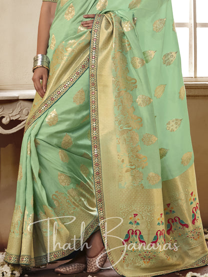 Sea green Pure Dola Silk Saree with Fancy Lace Border