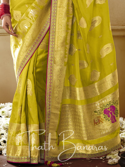 Yellow and magenta Pure Dola Silk Saree with Fancy Lace Border