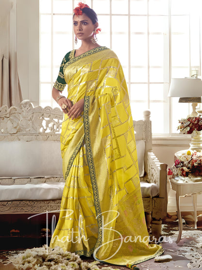 Yellow and green Pure Dola Silk Saree with Fancy Lace Border