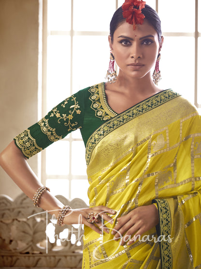 Yellow and green Pure Dola Silk Saree with Fancy Lace Border