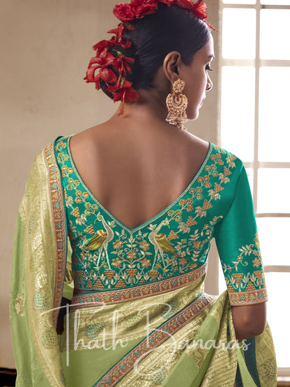 Light green Pure Dola Silk Saree with Fancy Lace Border