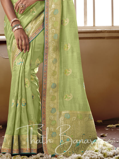 Light green Pure Dola Silk Saree with Fancy Lace Border