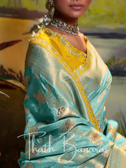 Aqua Blue Pure Dola Silk with Fancy Lace Border and Embroidery Worked Blouse