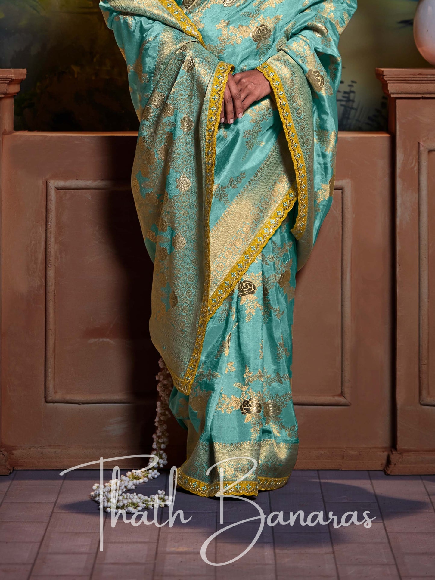 Aqua Blue Pure Dola Silk with Fancy Lace Border and Embroidery Worked Blouse