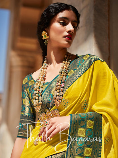 Yellow Paithani saree with designer blouse