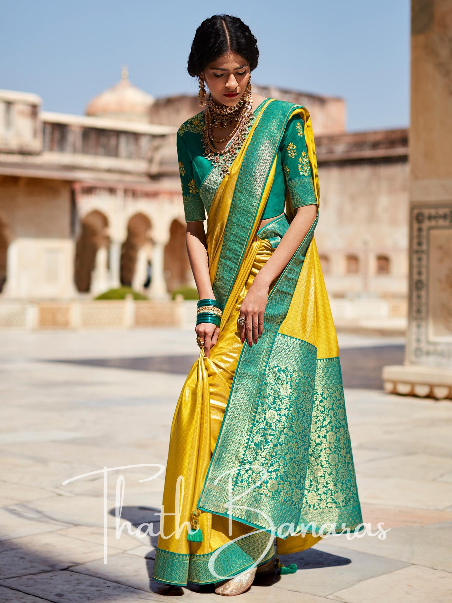 Mustard yellow Paithani saree with designer blouse