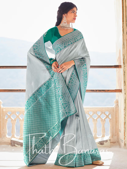 Sea green Paithani saree with designer blouse