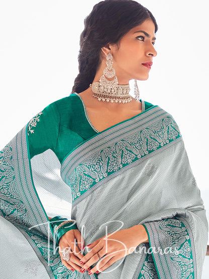 Sea green Paithani saree with designer blouse