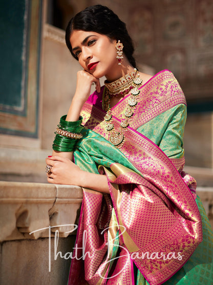 Turquoise green Paithani saree with designer blouse