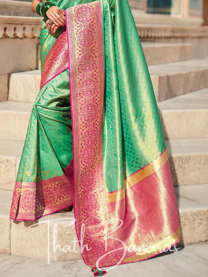 Turquoise green Paithani saree with designer blouse