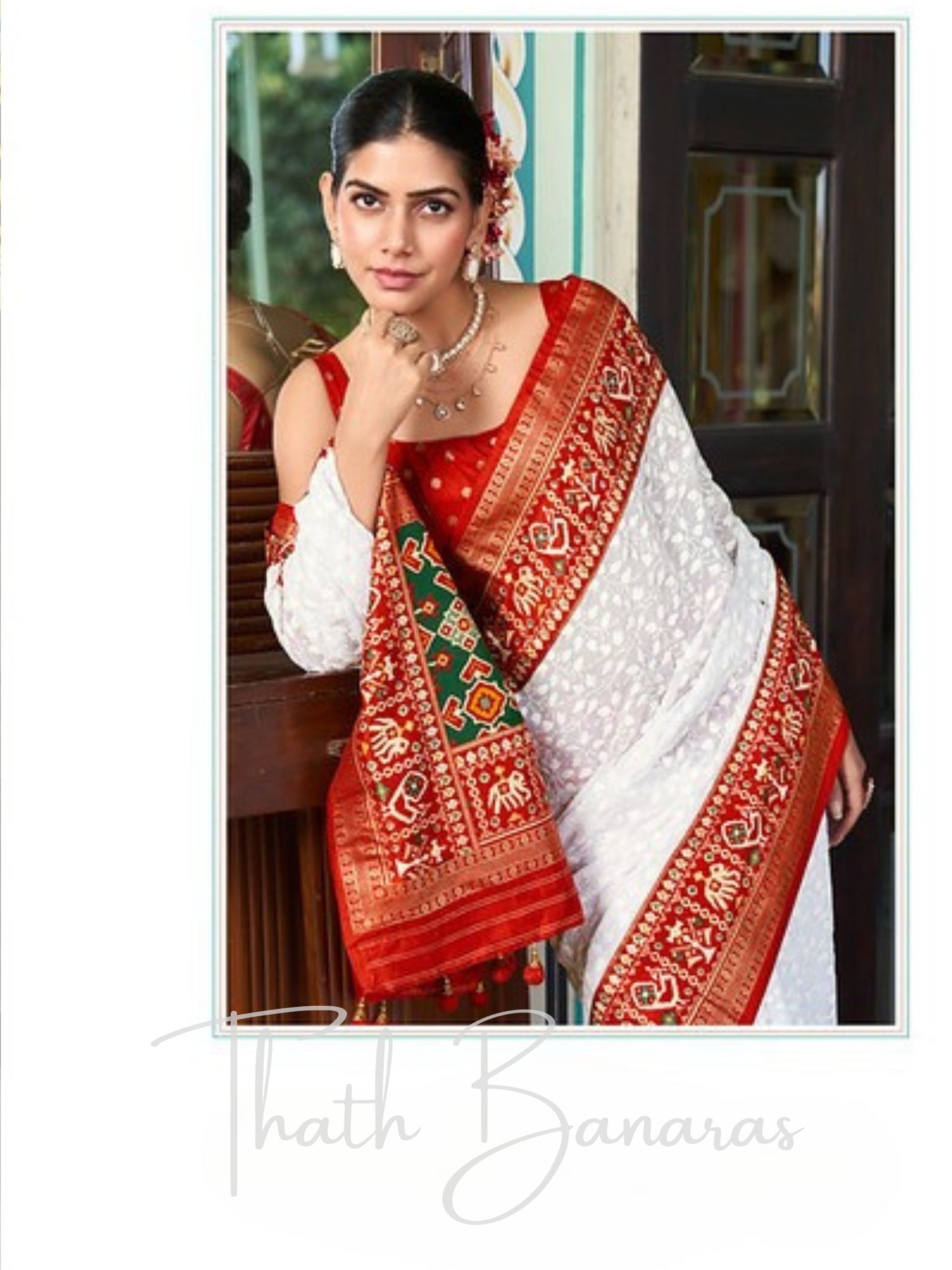 White Lucknowi Georgette Saree with Exquisite Patola Weave