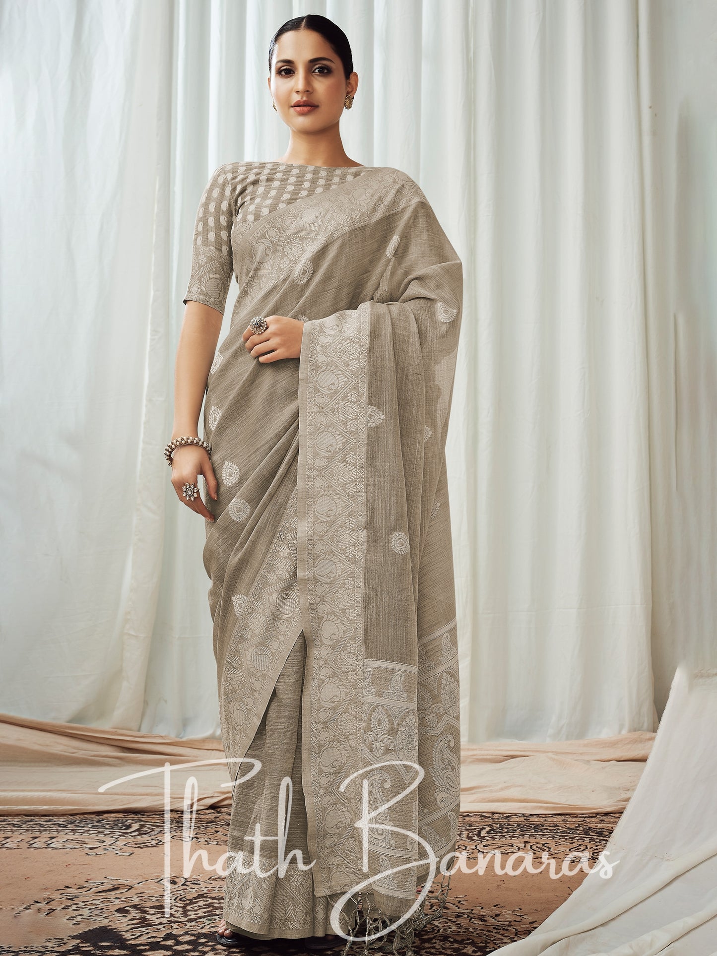 Greyish brown soft luckhnowi rich pallu linen saree.