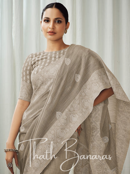 Greyish brown soft luckhnowi rich pallu linen saree.