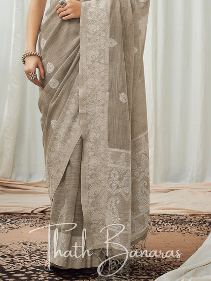 Greyish brown soft luckhnowi rich pallu linen saree.