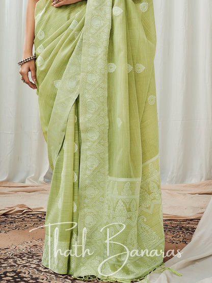 Lemon green soft luckhnowi rich pallu linen saree.