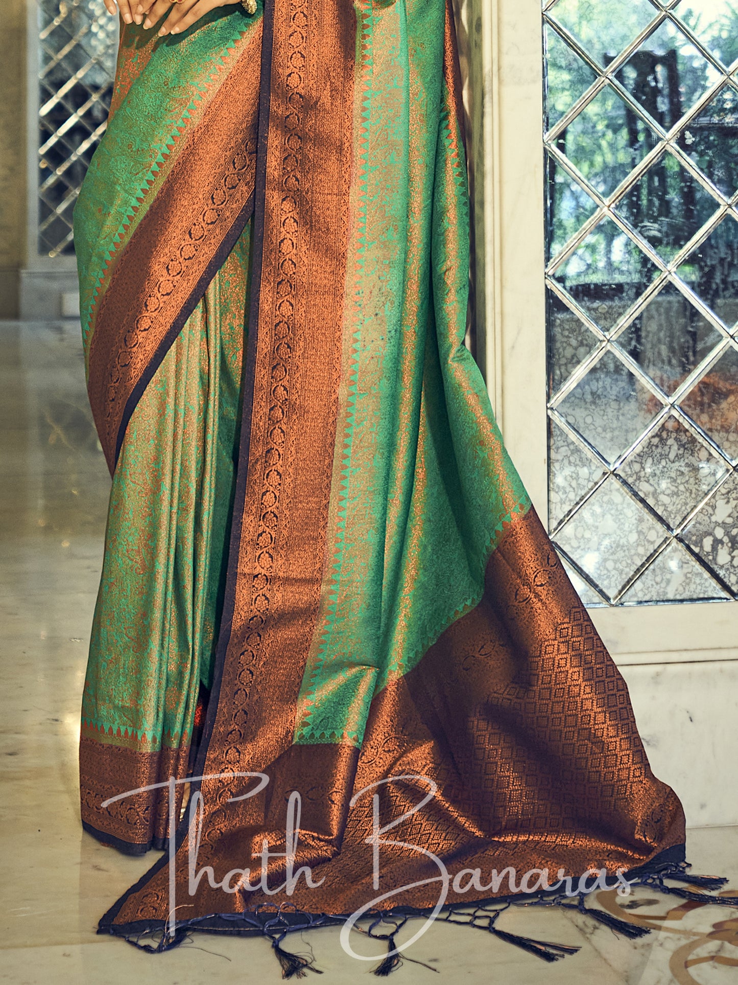 Leaf green and royal blue gold zari weaving embroidery