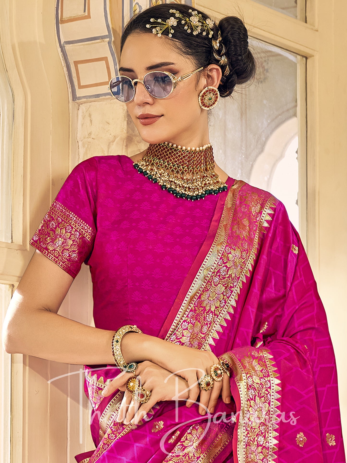 Fuchsia pink Kanchipuram Silk Saree with gold ethnic motifs zari border