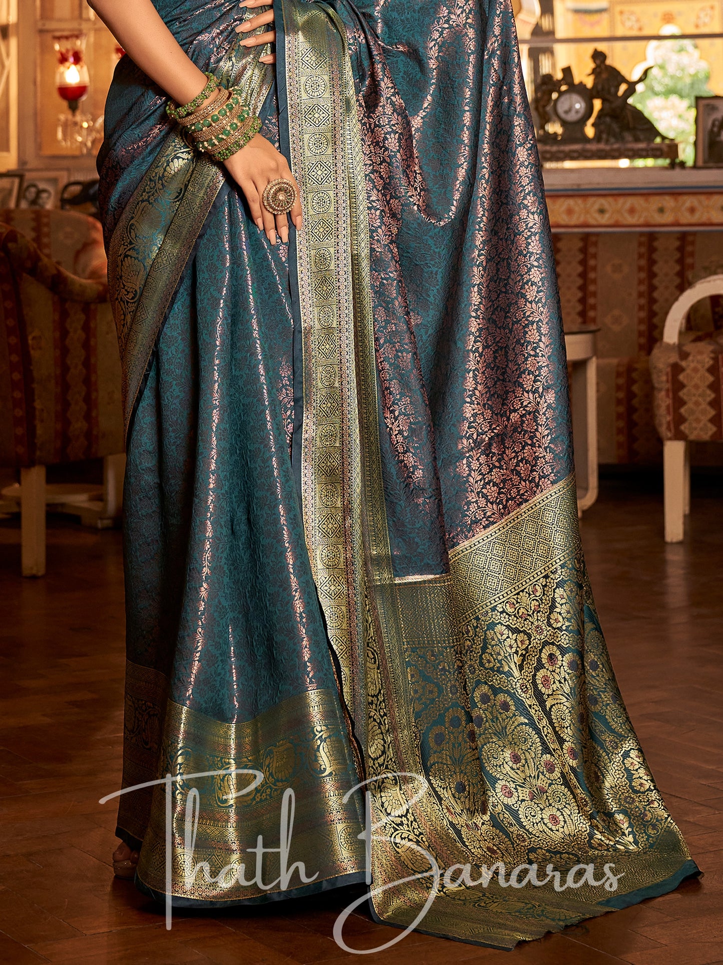 Blueish Green Regal Copper Threads Kanchipuram Saree