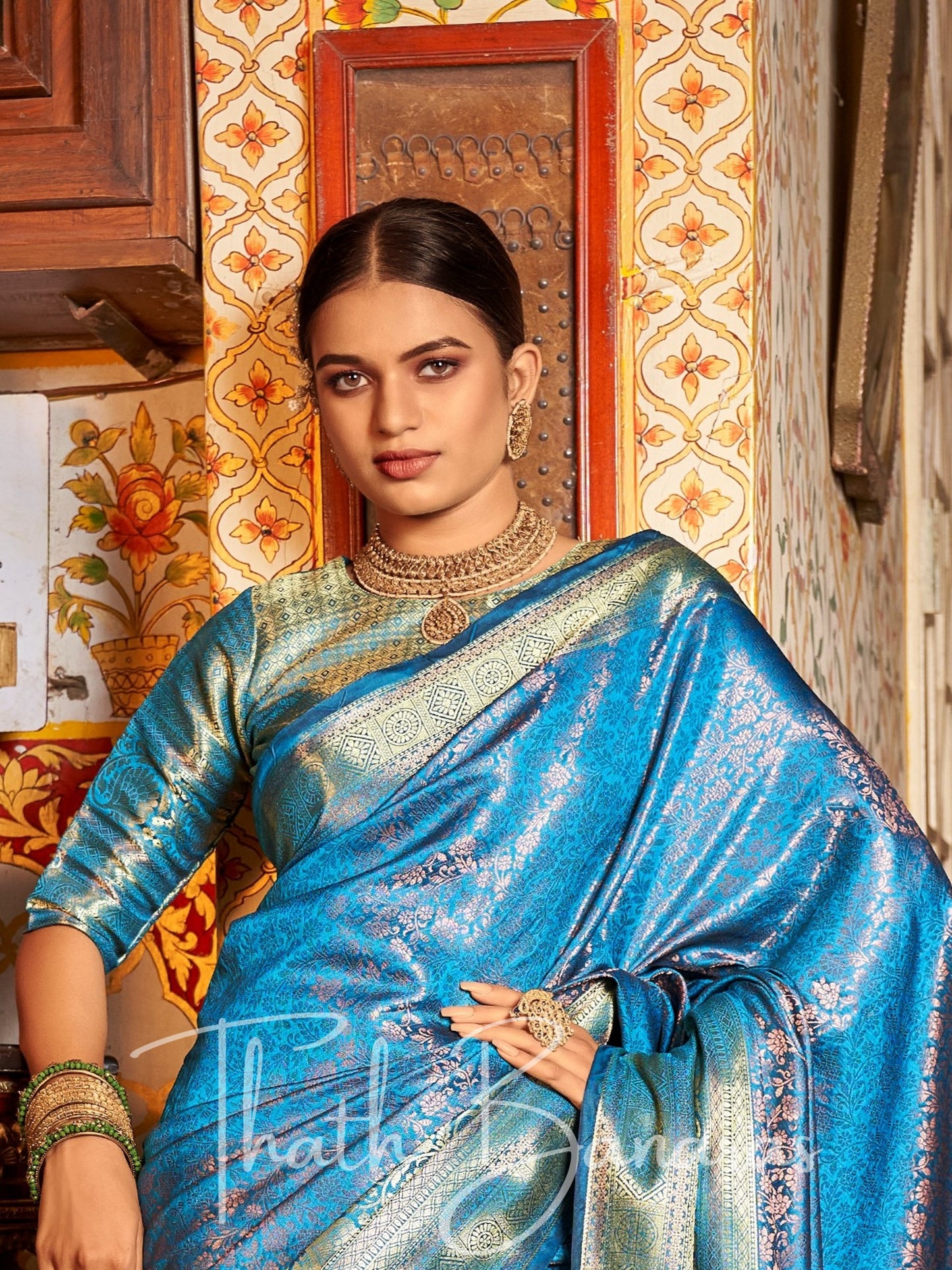 Turquoise Blue Regal Copper Threads Kanchipuram Saree