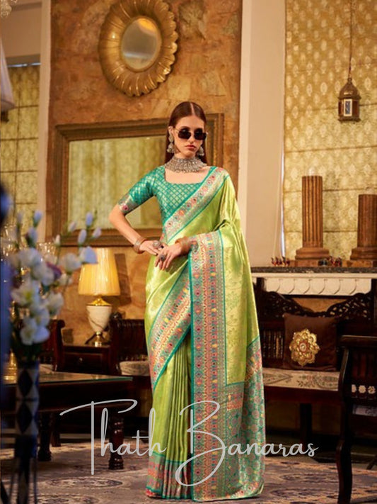 Elegant Pista Green Tissue Silk Saree with Zari Weaving and Intricate Blouse Work