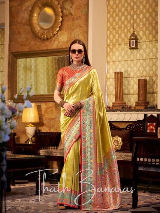 Elegant Fuel Yellow Tissue Silk Saree with intricate work