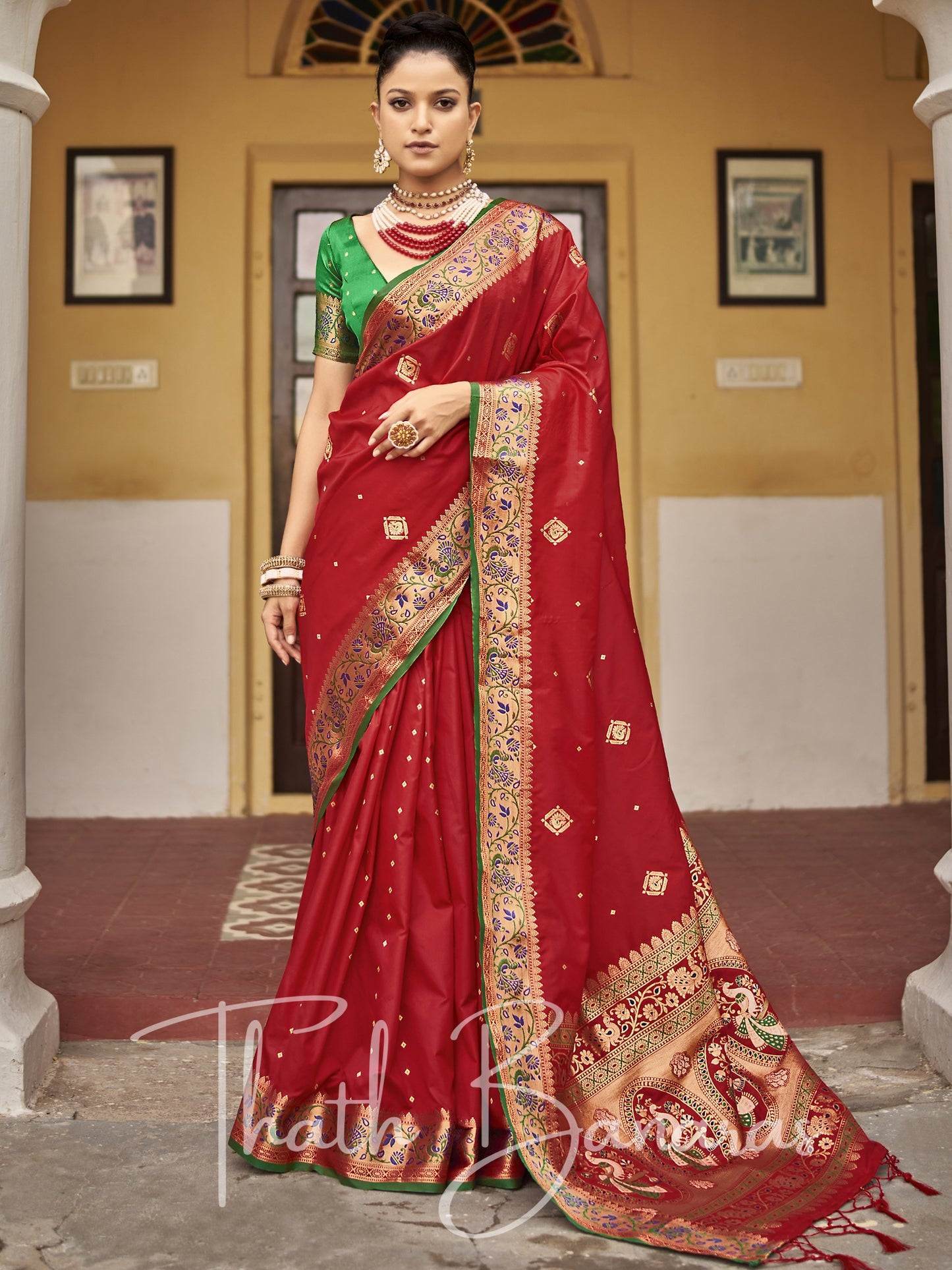 Red and green Soft Silk Weaving with contrast Blouse and Designer Pallu