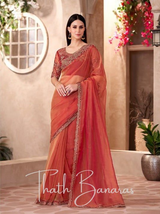 Orange Tissue Traditional Saree with Embroidered Work.