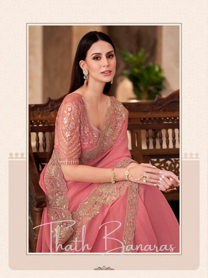 Peach Radiance Embroidered Georgette Party Wear Saree
