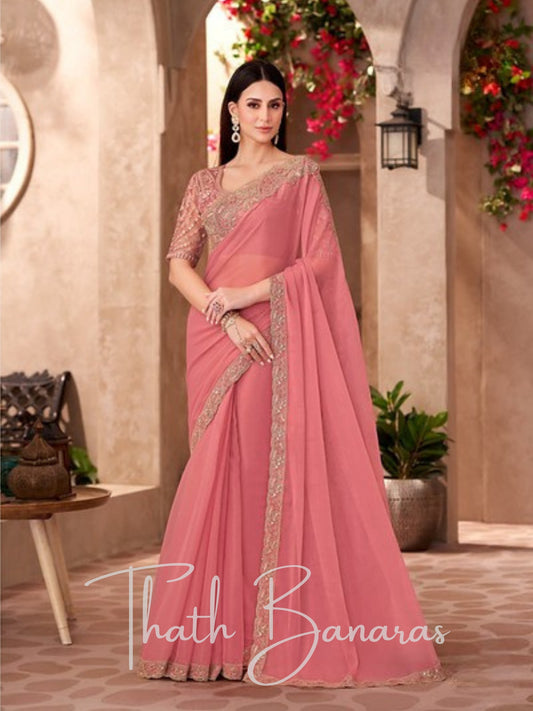 Peach Radiance Embroidered Georgette Party Wear Saree